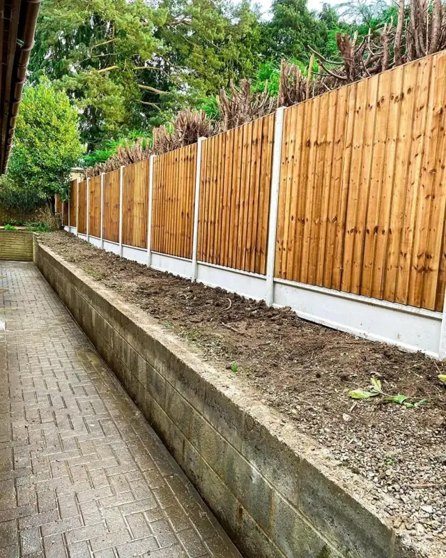 New featheredge fence panels on the same wall